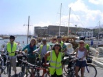 Aydin with a group of international cyclists around the island